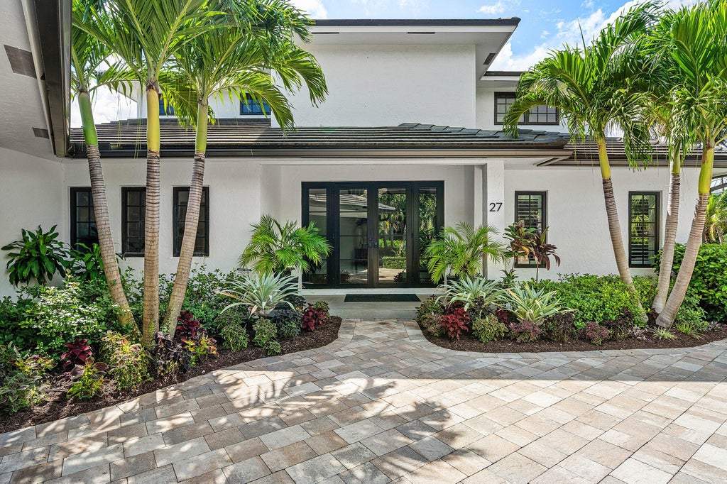 Photo of 27 Hibiscus Way, Ocean Ridge, FL 33435 (MLS # B26094722)