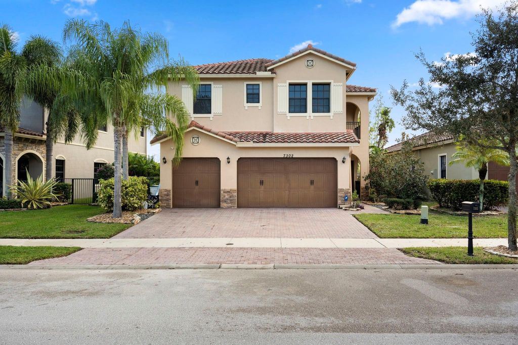 Photo of 7302 NW 111th Way, Parkland, FL 33076 (MLS # F10556652)
