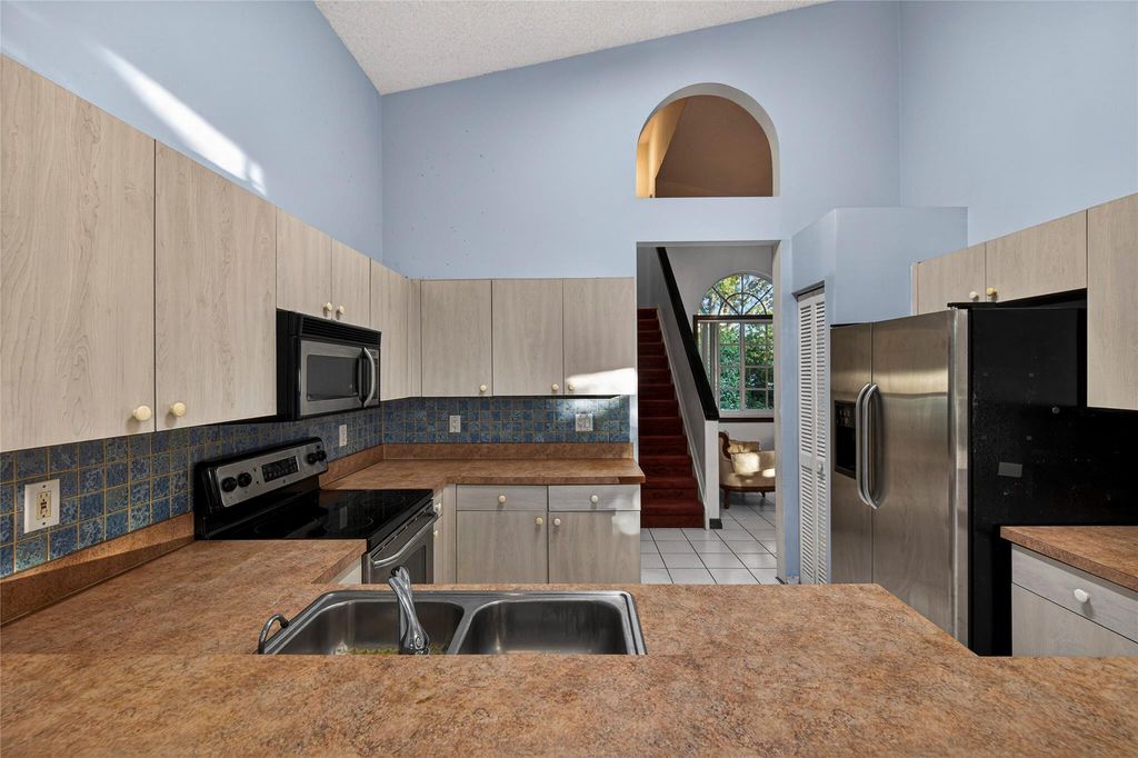 Photo of 693 NW 46th Avenue, Deerfield Beach, FL 33442 (MLS # F10549978)