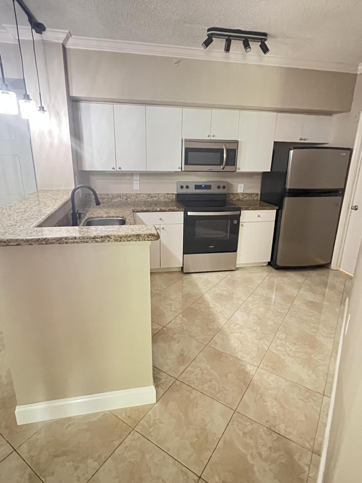ST ANDREWS AT POLO CLUB CONDO - Residential Lease