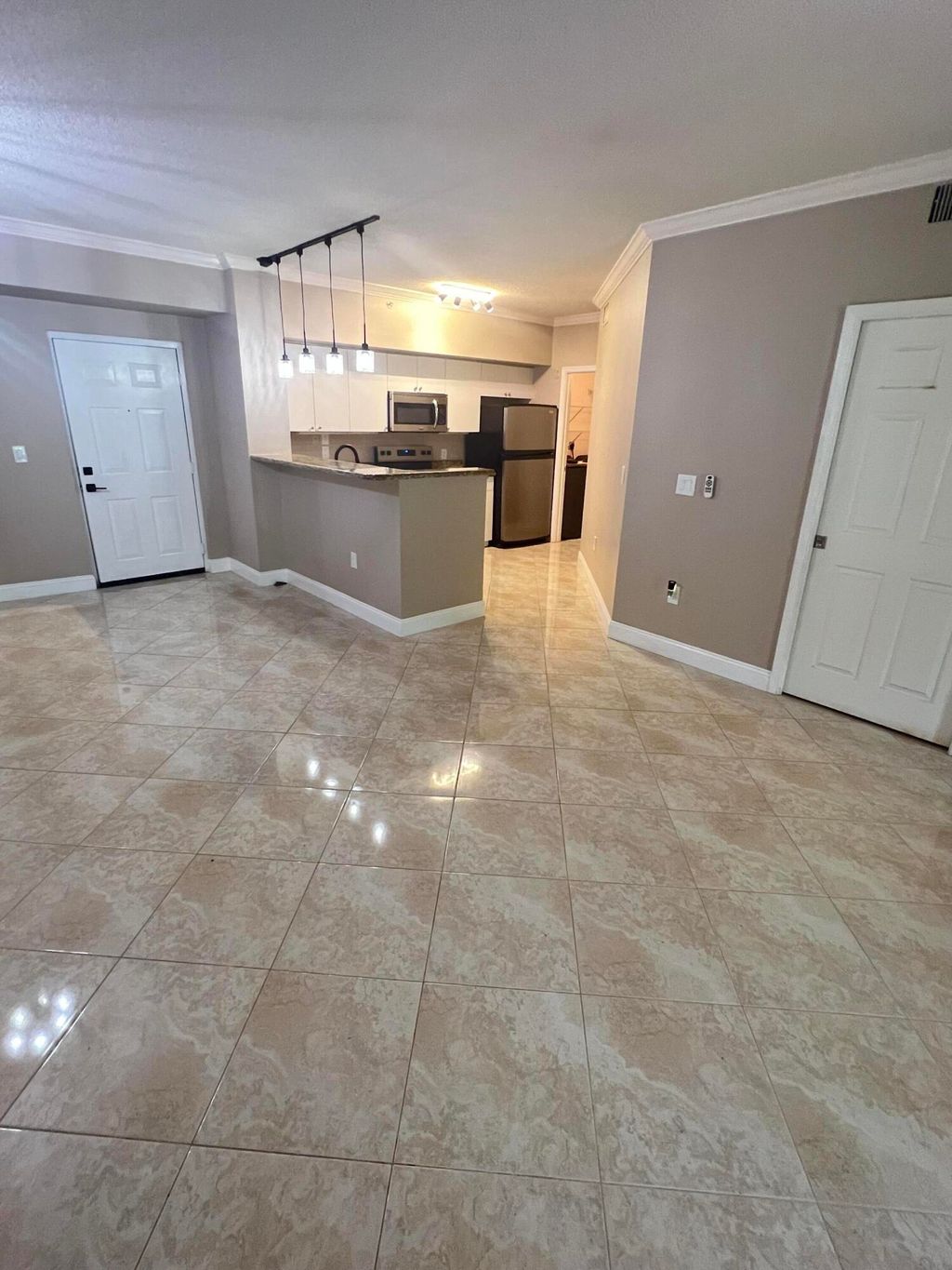 Photo of 11780 St Andrews Place #105, Wellington, FL 33414 (MLS # B26026612)