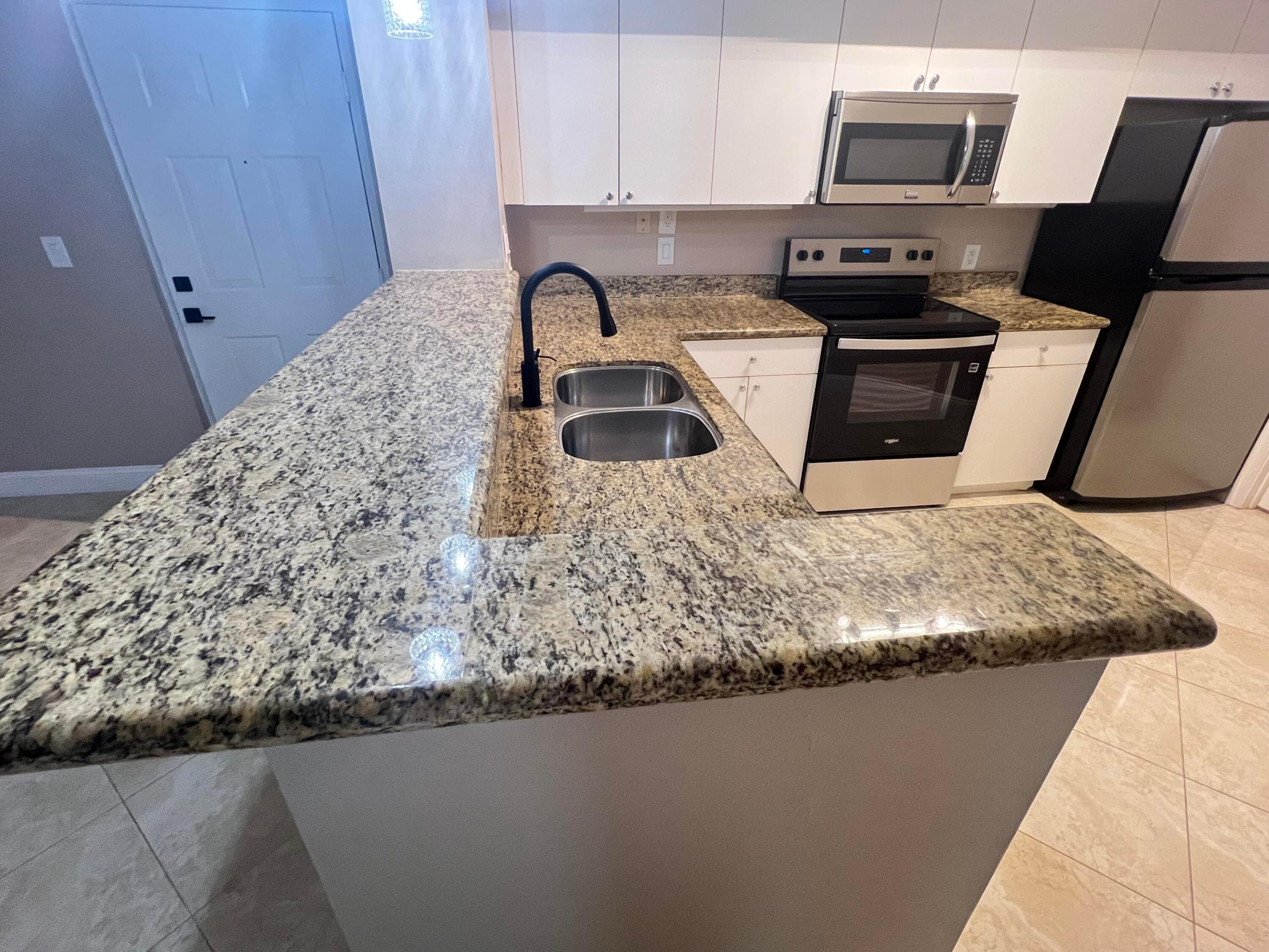 ST ANDREWS AT POLO CLUB CONDO - Residential Lease