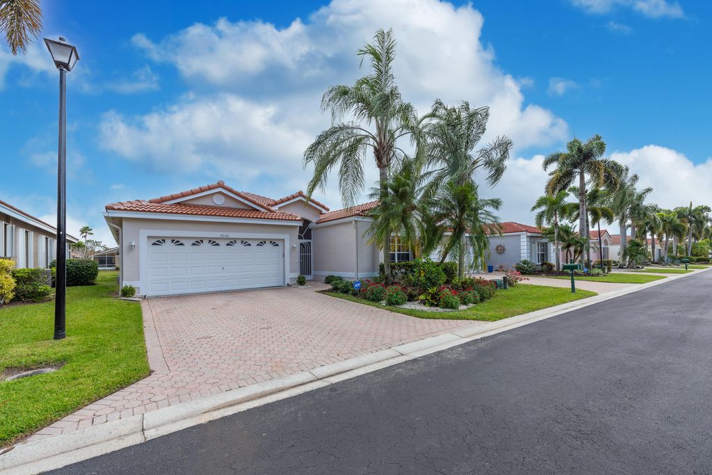 Photo of 9556 Honeybell Circle, Boynton Beach, FL 33437 (MLS # R11144977)