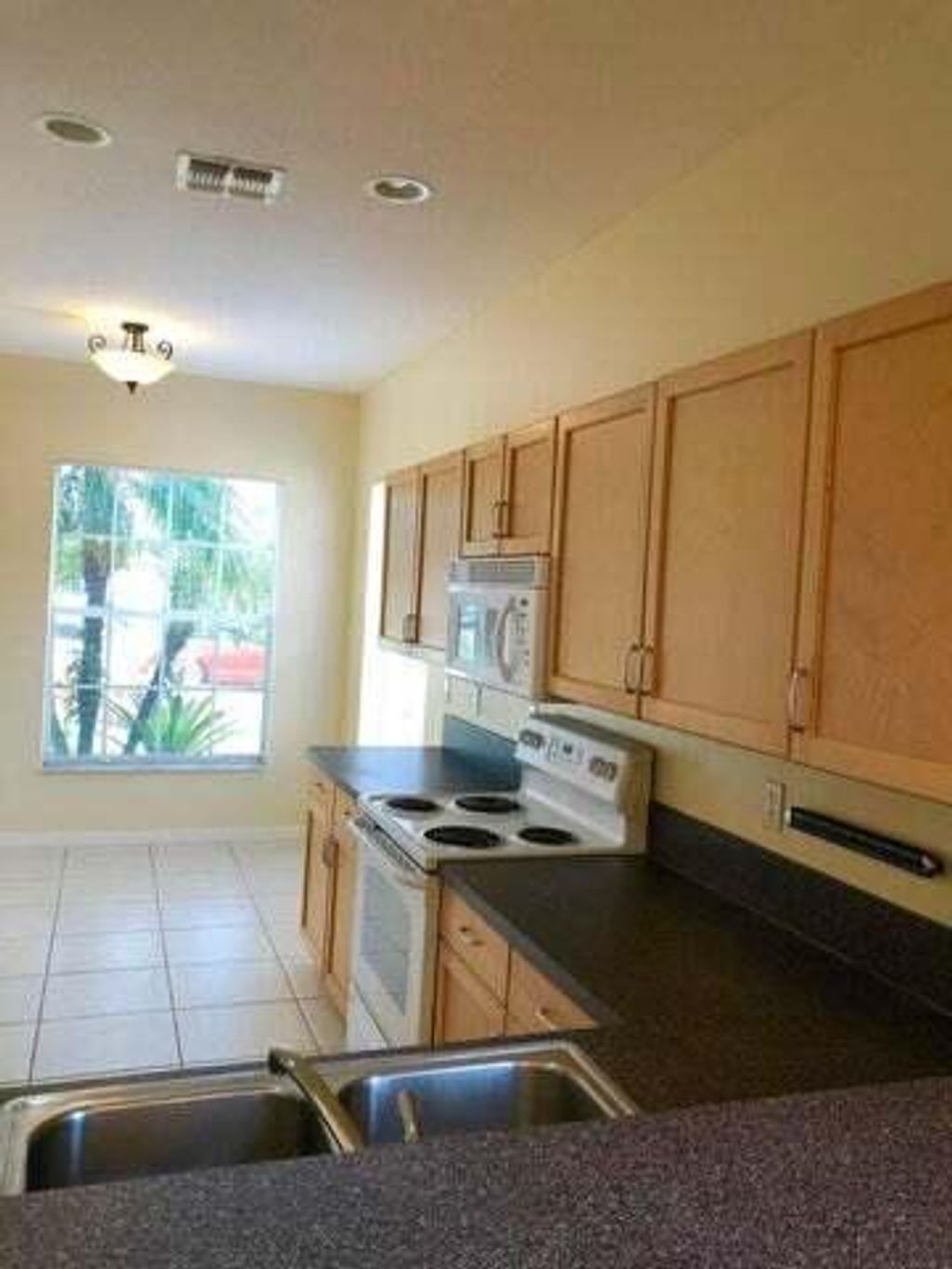 Photo of 10078 SW Chadwick Drive, Port Saint Lucie, FL 34987 (MLS # R11098478)