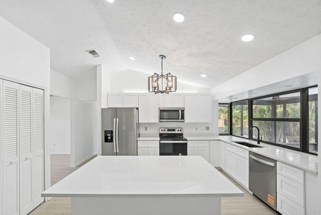 Photo of 5810 Balsam Drive, Fort Pierce, FL 34982 (MLS # R11118918)