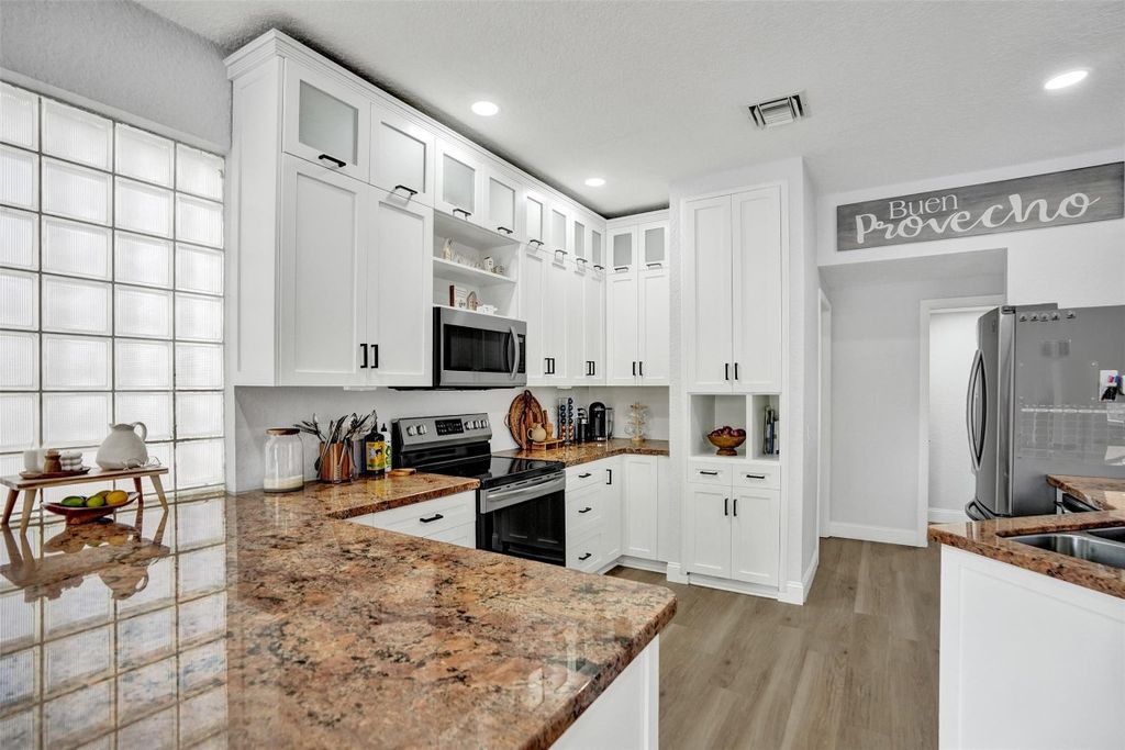 Photo of 9814 NW 1st Manor, Coral Springs, FL 33071 (MLS # F10548457)