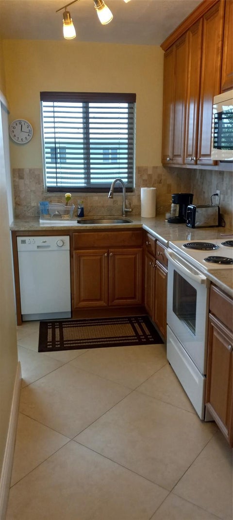 Tiny photo for 2100 NE 38th Street #218, Lighthouse Point, FL 33064 (MLS # B26076442)