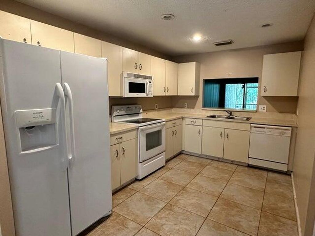 Photo of 4103 NW 114th Avenue, Coral Springs, FL 33065 (MLS # R11122293)