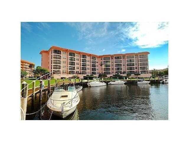 This apartment was redone and converted to a 2 bedroom 2 bath unit from a former 1 bedroom, 1.5 bath apartment. Beautiful marina views from screened balcony. Private beach, community pool, gym and clubhouse with kitchen. BBQ area. Underground parking.
