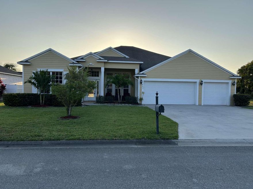 Beautiful move in ready 3 bd 2 bath office can be 4th br, 3 car garage new roof new air conditioning system new flooring paint inside and outside new appliances stainless steel, lighting gated neighborhood on small lake with fountain 2600 sq ft