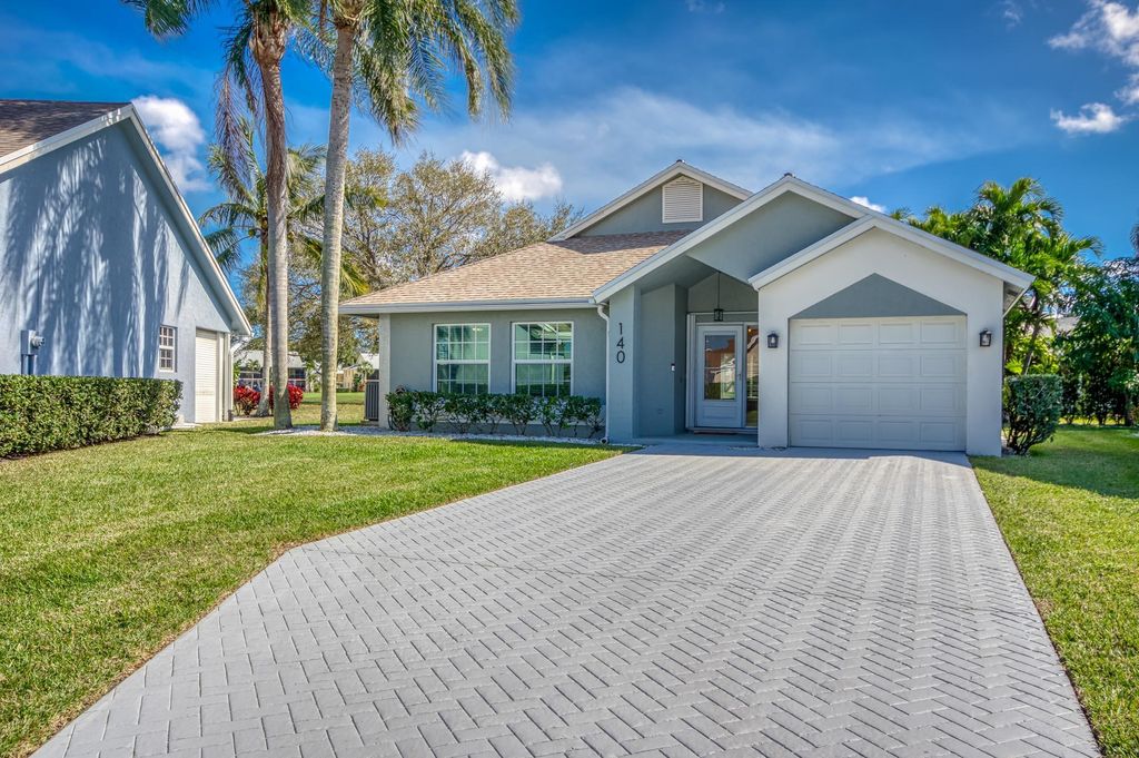 Photo of 140 Palomino Drive, Jupiter, FL 33458 (MLS # R11053990)