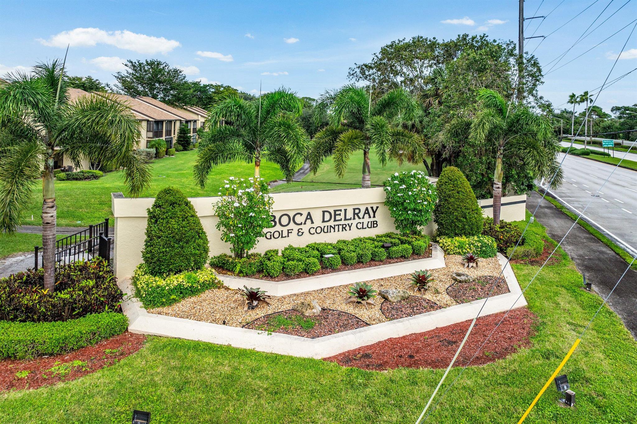 Welcome to the 55+ Boca Delray Country Club where this Beautiful newly renovated Condo is available. This 2 bedroom, 2 bath Condo includes brand new floors throughout, smooth vaulted ceilings and the whole unit has been freshly painted. The kitchen has been upgraded with new countertops, backsplash, a large eat-in bar top and all new appliances. The Bathrooms have updated vanities, mirrors and new shower in Master bathroom. Boca Delray CC offers Golf (pay to play) *no membership fee*, Tennis, pickleball and so many other activities. Come and Enjoy all South Florida has to offer!