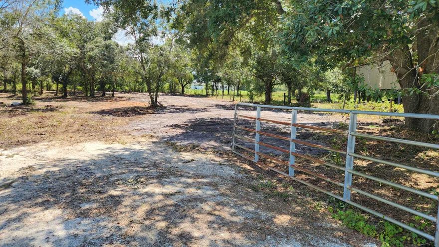 Discover this beautiful 1.25-acre cleared  lot in the peaceful  area of Okeechobee! This fully fenced property comes ready for your vision, power available . A well is already on the property, giving you a valuable head start for future use. With a gated entrance, excellent access, and plenty of space, this parcel is ideal for a weekend getaway, recreational use, or a future homesite. Don't miss this well-prepared and attractive 1.25-acre property in a growing rural community!