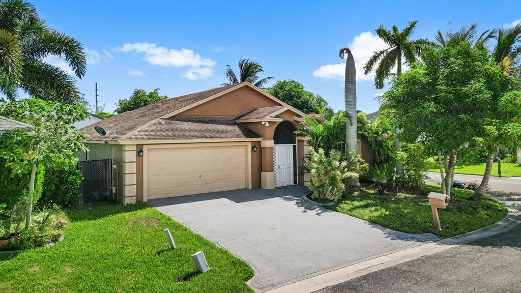 Photo of 1516 Patrick Way, Greenacres, FL 33413 (MLS # R11131420)