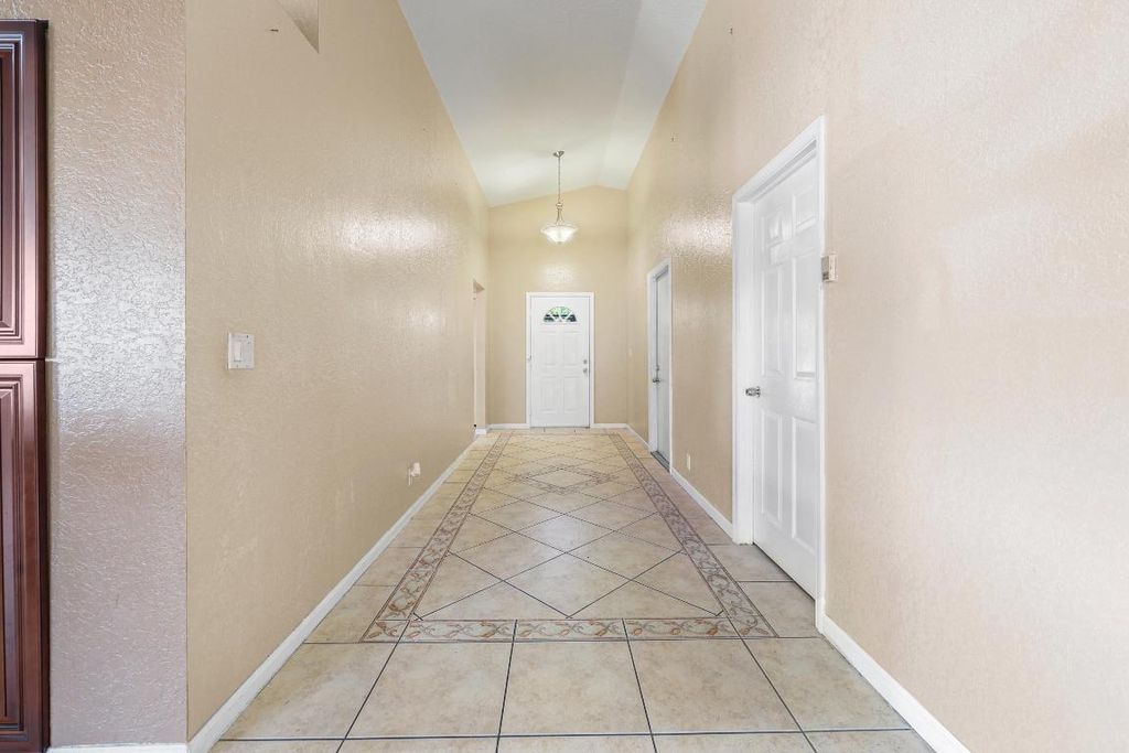 Photo of 1516 Patrick Way, Greenacres, FL 33413 (MLS # R11131420)