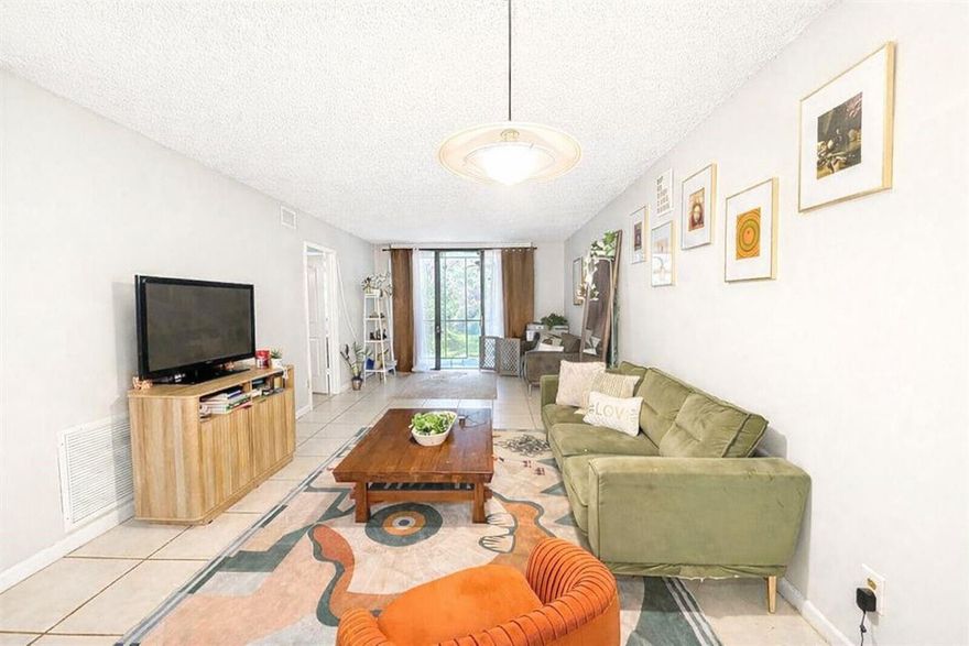 Oversized 2-bedroom, 2-bath water view condo located in the desirable Mira Lago community of Oakland Park. This unit offers a bright open living and dining area, fully renovated kitchen,  tile floors throughout, generous closet space, and a screened patio.  Kitchen features ample cabinetry and counter space. Primary bedroom includes walk-in closet and en-suite bath. Community amenities include pool, and scenic walking paths. 800ft to grocery store/plaza, dining, public transportation, major roadways, and beaches. One assigned parking space plus open guest parking. Washer and dryer in unit.