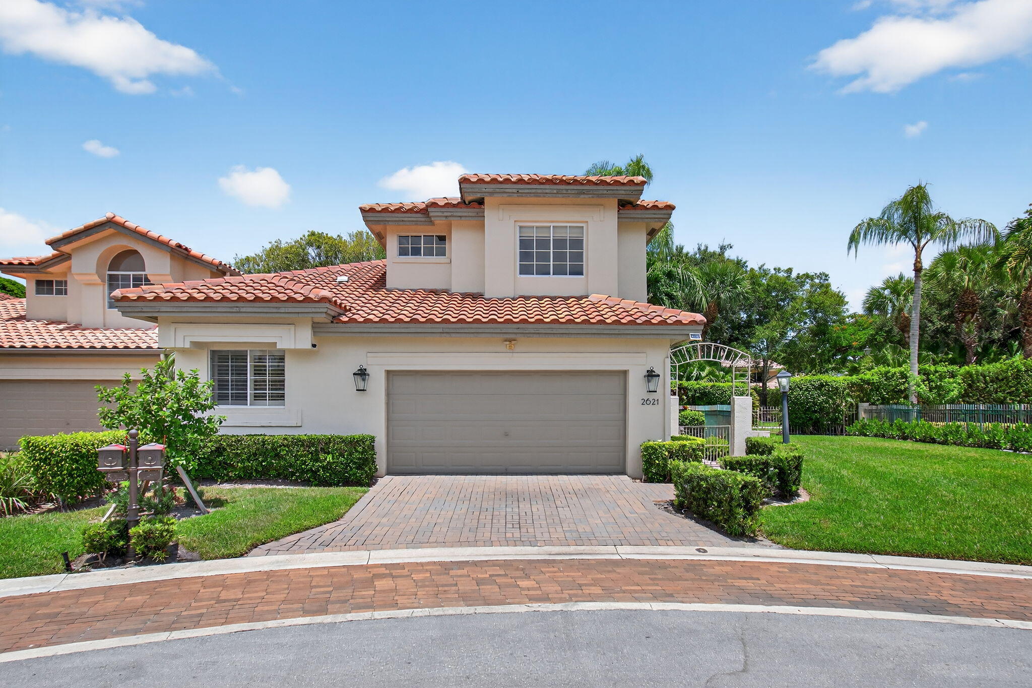 Welcome to this stunning 3-bedroom, 3.5-bathroom remodeled home located on a quiet cul-de-sac in the highly sought-after Village of Laurel Pointe within Broken Sound Country Club. Spanning 2,367 square feet, this bright and spacious residence features soaring vaulted ceilings, a thoughtfully designed layout, and designer finishes throughout. The luxurious primary suite is conveniently located on the main level and offers dual walk-in closets, a spa-like bathroom with a freestanding soaking tub, and a frameless glass shower. Upstairs, you'll find two generously sized guest bedrooms, each with its own en-suite bathroom, providing privacy and comfort for family or visitors.
