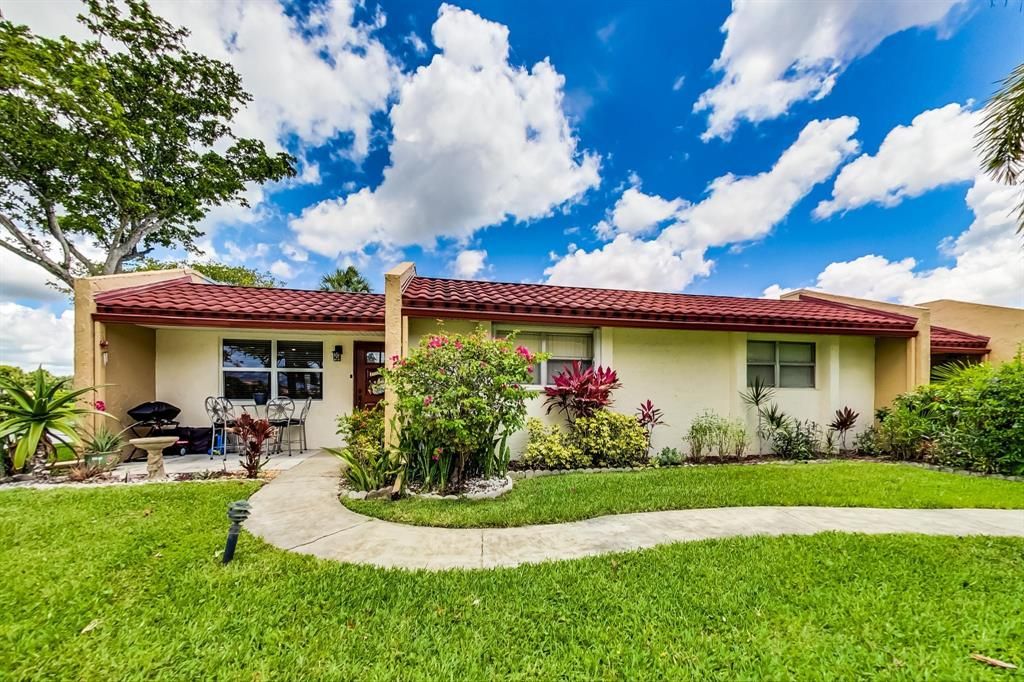 Photo of 453 Lake Evelyn Drive, West Palm Beach, FL 33411 (MLS # R10806273)