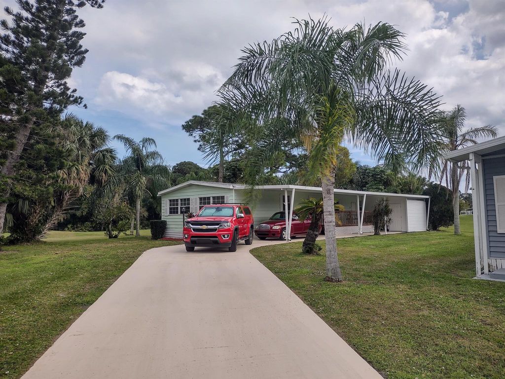 Photo of 5 Montanzas Road, Port Saint Lucie, FL 34952 (MLS # R10960685)