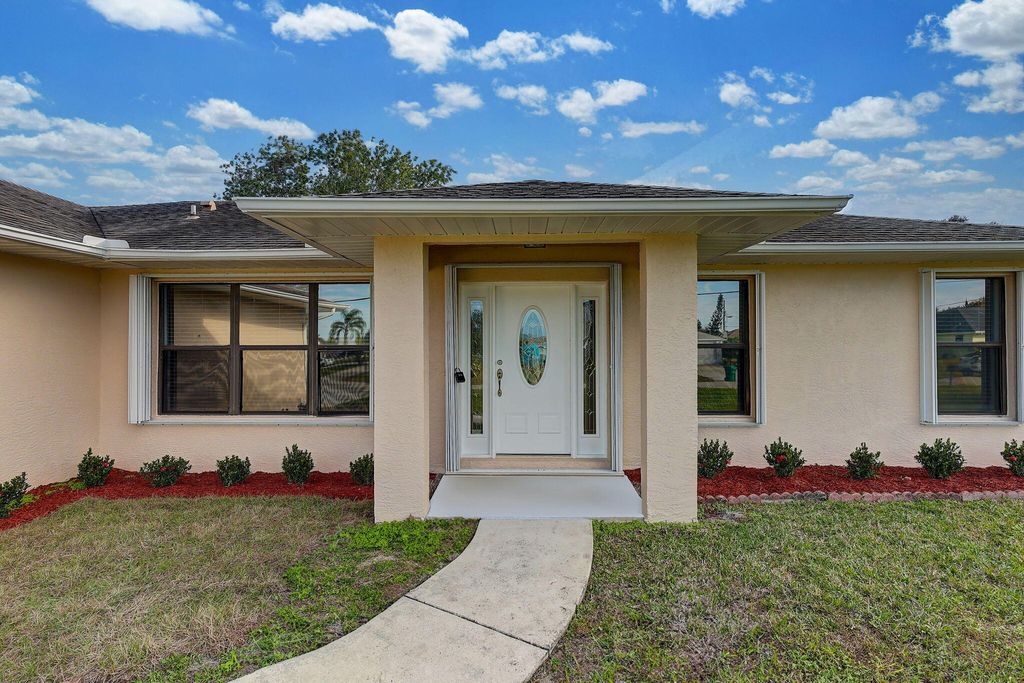Photo of 644 SW Violet Avenue, Port Saint Lucie, FL 34983 (MLS # R11055923)