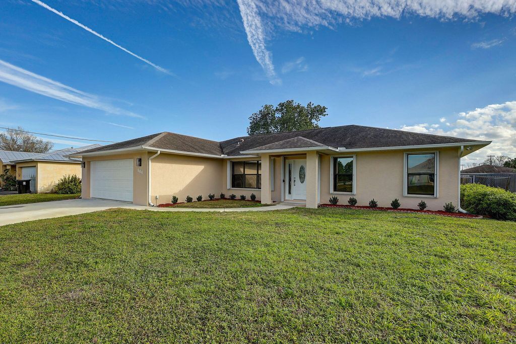 Photo of 644 SW Violet Avenue, Port Saint Lucie, FL 34983 (MLS # R11055923)