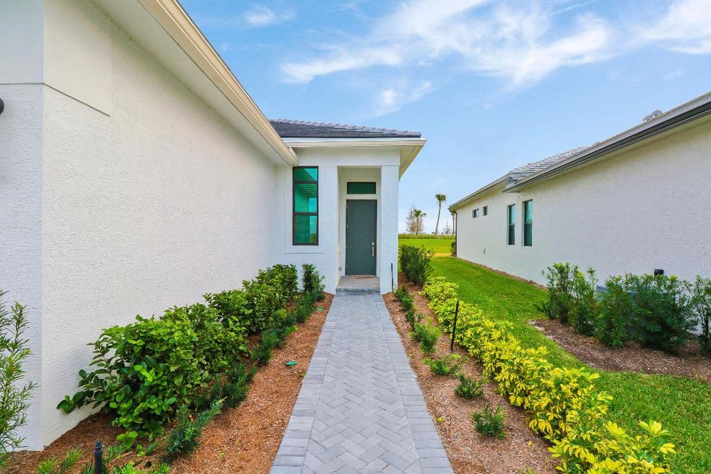 Photo of 9285 SW Pepoli Way, Port Saint Lucie, FL 34987 (MLS # R10953146)