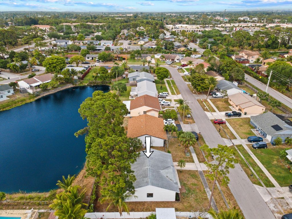 Photo of 4251 Centurian Circle, Greenacres, FL 33463 (MLS # R11075182)