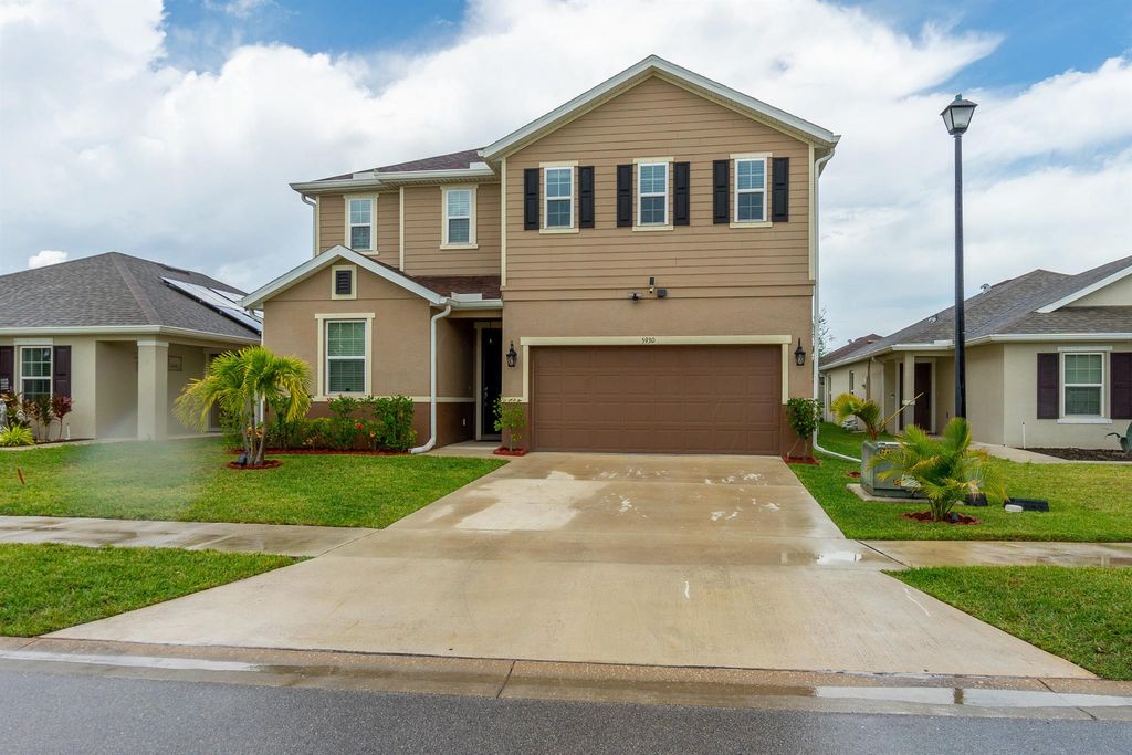 Photo of 5930 NW Pine Trail Circle, Port St Lucie, FL 34983 (MLS # R10887268)