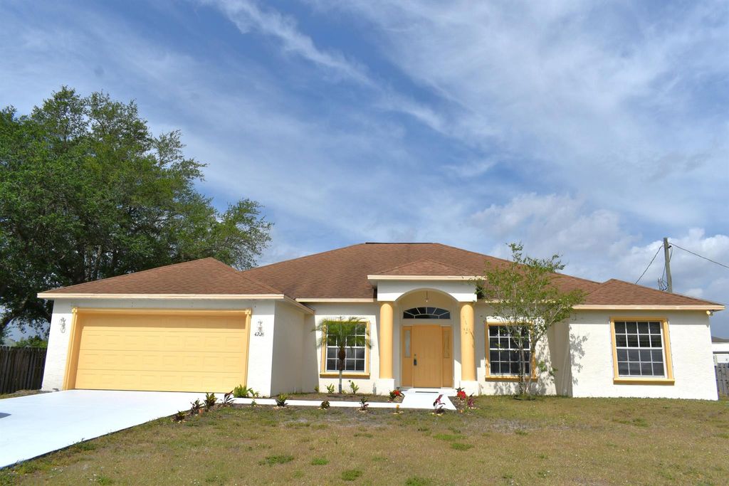 Photo of 4226 SW Whitebread Road, Port St Lucie, FL 34953 (MLS # R10975066)