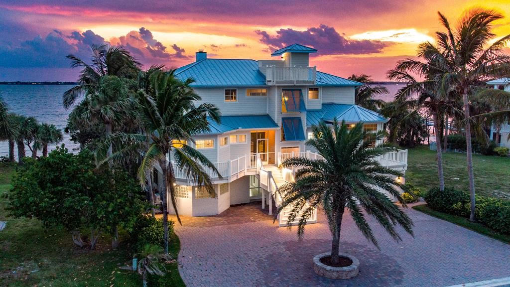 Photo of 7667 Pelican Pointe Drive, Jensen Beach, FL 34957 (MLS # R10715593)