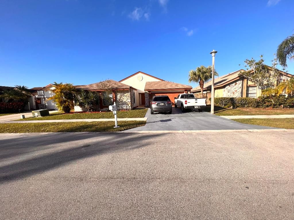 Photo of 20991 Woodspring Avenue, Boca Raton, FL 33428 (MLS # R11059547)
