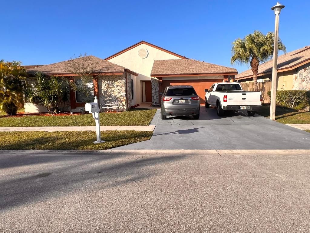 Photo of 20991 Woodspring Avenue, Boca Raton, FL 33428 (MLS # R11059547)