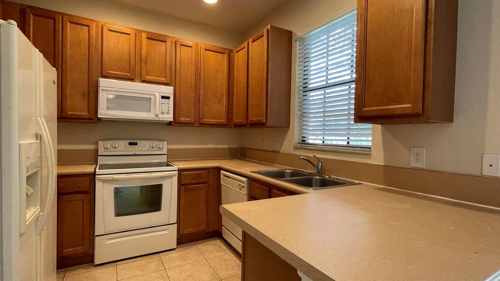 Photo of 1717 SW Umbria Street, Port Saint Lucie, FL 34953 (MLS # R11106126)