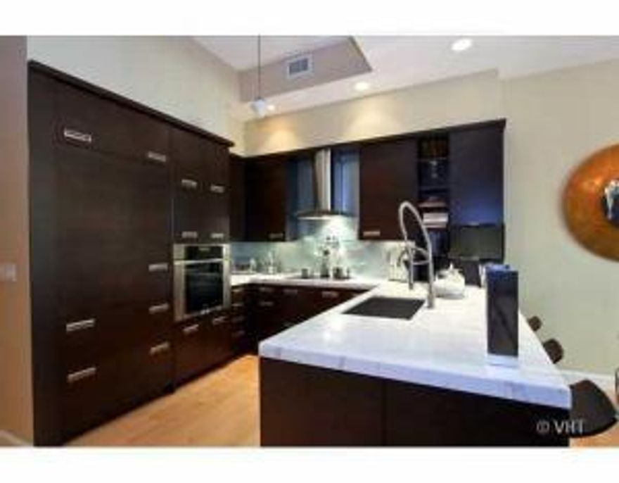 Very nicely upgraded 1 bedroom 1 1/2 bath loft with 26' ceilings!  

This contemporary kitchen has been fully renovated that includes marble countertops with large breakfast bar, custom built in Sub Zero refrigerator and Miele Range with hood, custom cabinets and backsplash with large stainless steel sink.  

Real wood floors on 1st floor, and upgraded carpet in loft (new).  

The 1/2 bath has also been updated, and the unit is currently being completely repainted.  

Don't miss this one of a kind loft in the heart of downtown in upscale One City Plaza close to intracoastal waterfront, beaches, Cityplace, Palm Beach Atlantic University and Clematis St.

$100 application fee and $ 300 move-in fee.

Rooftop pool with amazing city views, sauna, steam, fitness, 24 hour security and