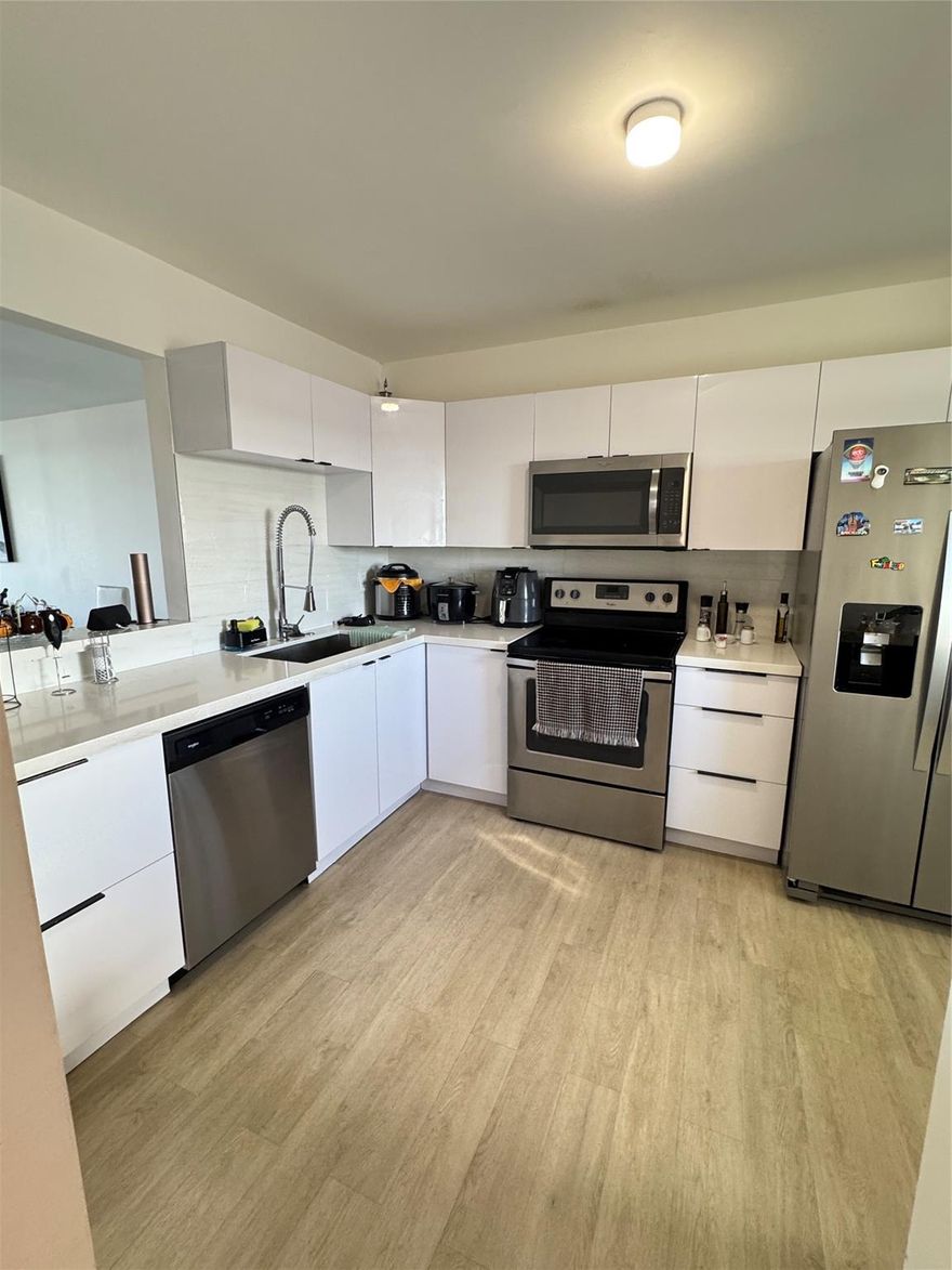 Large, bright, and fully updated.
This 2-bedroom, 2-bath condo delivers real finish quality and a layout that works. High ceilings. The primary suite includes a walkthrough shower and custom fixtures. The living area leads to a private balcony with direct views of the pool, and lake.

The community is gated with 24/7 security. Nice amenities. Assigned parking. Quick access to Skylake Mall, and near Aventura, the beaches, and I-95. 

HOA covers cable, internet, water, building insurance, pool, and common areas. No short-term rentals. HOA approval required. The owner is willing to pay the current assessment at closing.

The unit is vacant and ready.