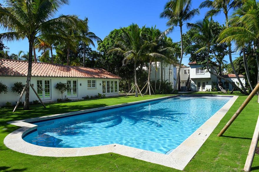 Fantastic rare In-Town Compound surrounding beautiful 75 foot pool. Wonderful Seaspray Avenue location, blocks from restaurants, shopping, beach, and Lake Trail. Main house features gorgeous great room with soaring ceilings and fireplace leading to formal dining room and loggia. Gourmet kitchen with top-of-the-line appliances, chef's island, and lots of natural light. Second floor with four bedrooms and living area. Two additional guest houses with a total of three bedrooms and four baths, as well as living rooms and kitchens. Gorgeous pool house with great room, full kitchen, and two bedrooms. Additional highlights include stunning grounds, garages for 3 cars, and plenty of space to entertain. To be sold As Is. All sizes approximate and subject to errors and verification. Sq. Ft. as per county tax rolls.