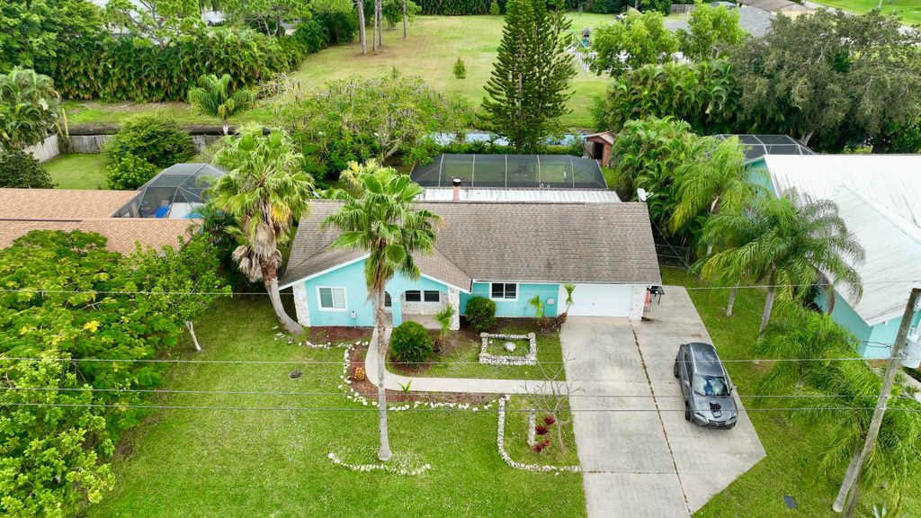 Photo of 2473 SE Burton Street, Port Saint Lucie, FL 34952 (MLS # R10938695)