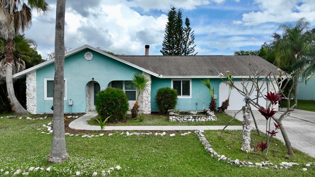 Photo of 2473 SE Burton Street, Port Saint Lucie, FL 34952 (MLS # R10938695)