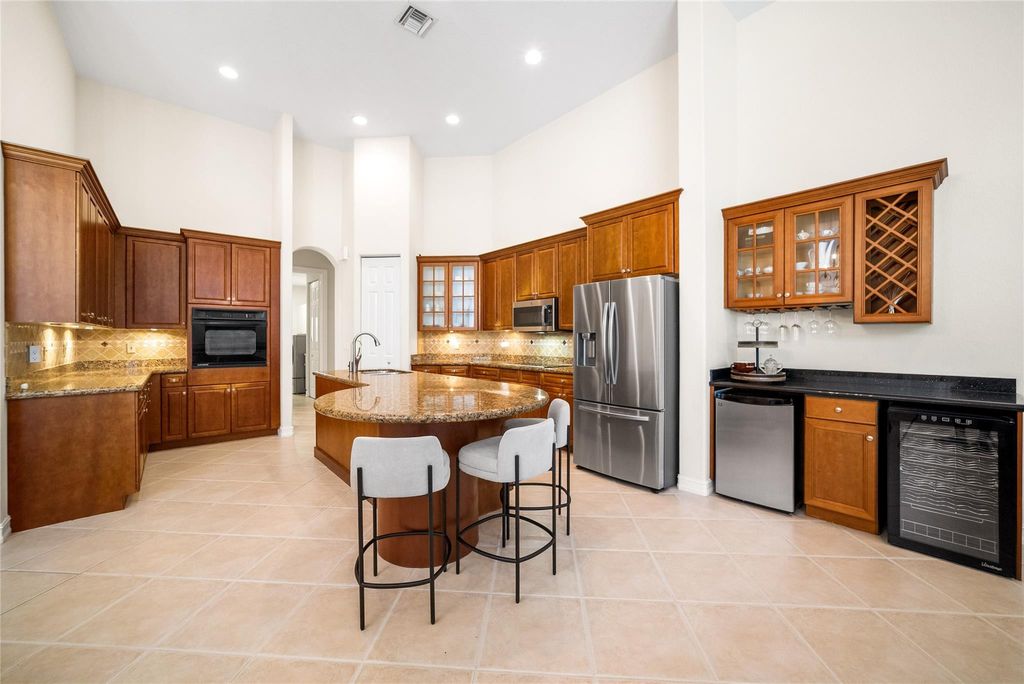 Photo of 7627 NW 127th Manor, Parkland, FL 33076 (MLS # F10523270)