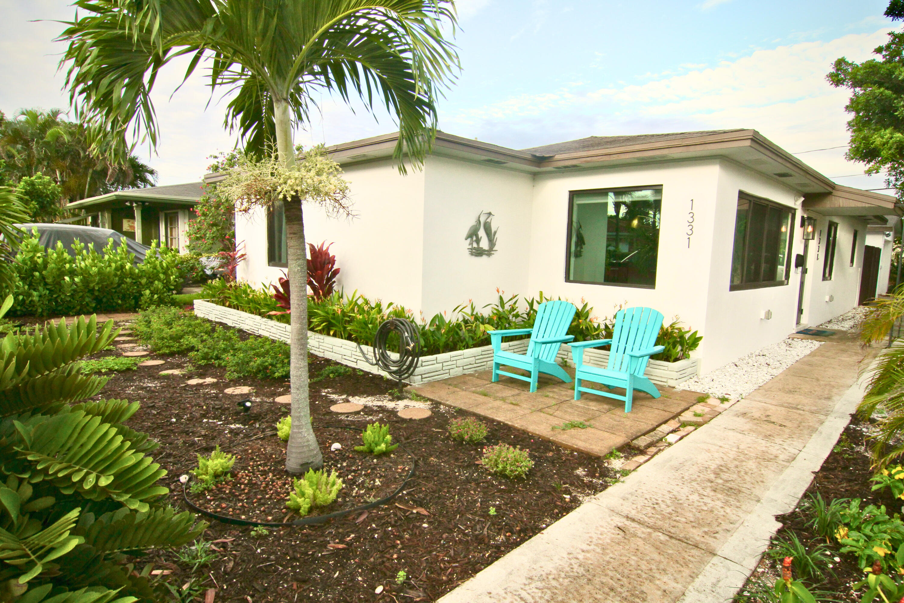 Welcome to your 2/1.5-North Lake Worth Beach Home & Garden Patio. Discover the charm of Eden Place, one of Lake Worth Beach's most desirable neighborhoods. This vibrant neighborhood is known for its friendly atmosphere, lush surroundings, and unbeatable location--just 5 minutes from downtown WPB, 1 Mile to SOSO neighborhood, restaurants, shops & everything else you love about the coastal lifestyle. This beautifully upgraded 2-bedroom, 1.5-bath Florida-style home features a bright and open floor plan, highlighted by cool Terrazzo floors, ample storage, and a spacious living room perfect for relaxing after taking a dip in the ocean. Offered furnished or unfurnished, this home is ready to suit your lifestyle. Don't miss your chance to enjoy the best of coastal living that's rarely available.