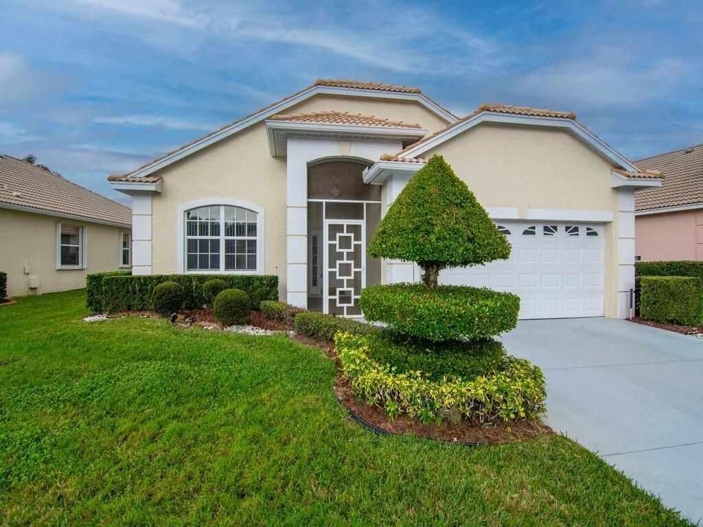 Photo of 867 NW Sorrento Lane, Port Saint Lucie, FL 34986 (MLS # R10950189)