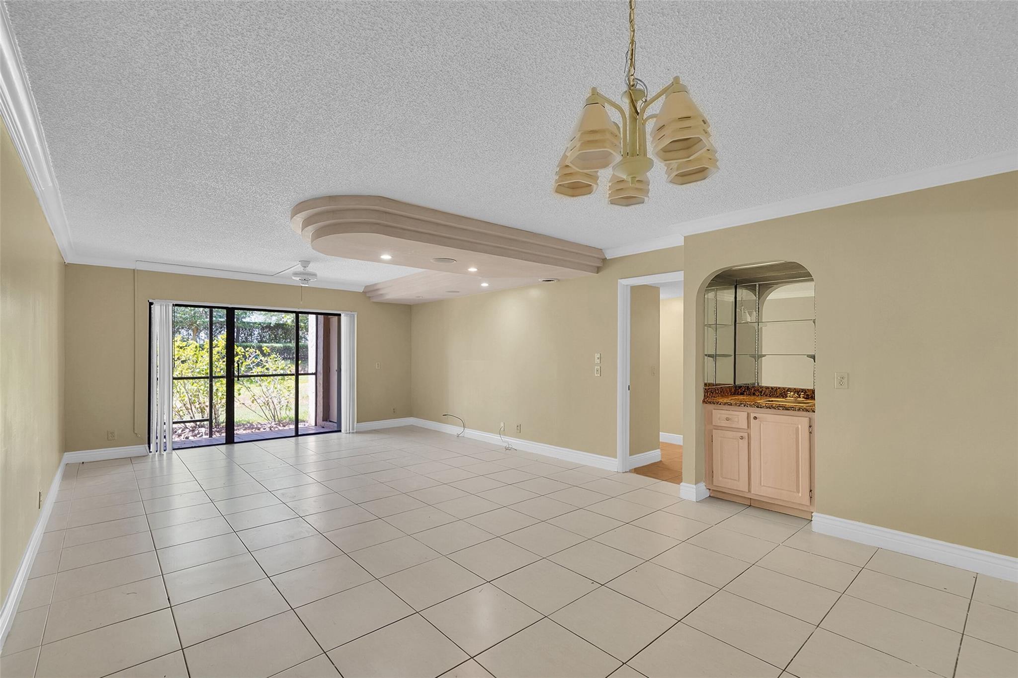 Spacious 2BR/2BA condo in prime Weston location! This first-floor unit features tile flooring throughout, a freshly painted interior, and a well-designed floor plan. Enjoy a bright living/dining area, large bedrooms, in-unit washer/dryer, and a screened balcony with garden views. Located near top-rated schools, shopping, dining, and highways. Access to Bonaventure Town Center with pool, tennis, gym & more. Move-in ready! (Kitchen Cabinets in photos will redone)