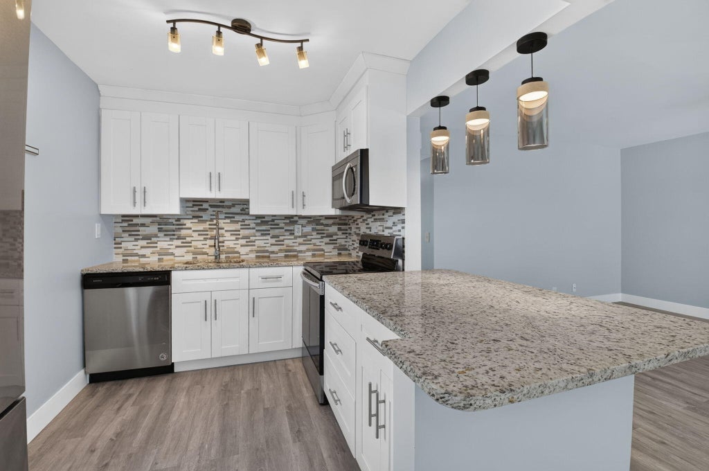 Photo of 428 Saxony Way, Delray Beach, FL 33446 (MLS # B26094683)