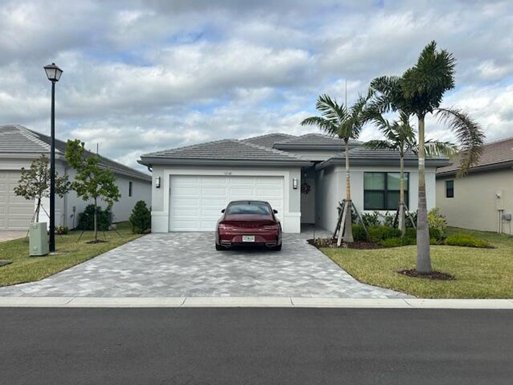 Photo of 12548 SW Green Creek Drive, Port Saint Lucie, FL 34987 (MLS # R11157107)