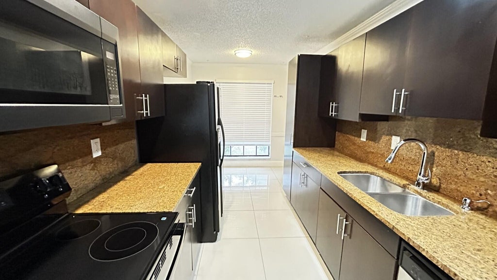 Photo of 3468 CLUSTER Road #3468, Miramar, FL 33025 (MLS # B26082523)