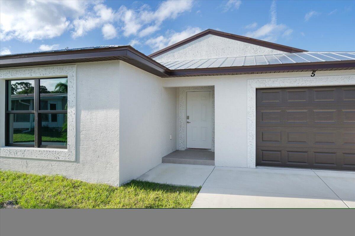 Wait until you see this model! This Gemini model is a rare 2 master suite home with a private den/office/3rd bedroom. So if you are looking to have your own quarters yet still live under the same roof, this model was designed for you! Water front view means you get to enjoy your morning coffee or evening cocktail wild enjoying the wildlife and serenity of the location. Metal roof with 25 yr warranty, hurricane impact windows, R30 insulation, white shaker cabinets throughout the home, granite counters in kitchen and bathrooms, duel master bathroom sinks, LED lighting, stainless steel appliances, the list goes on! Located on a Cul-de-sac with a great view of the lake. Builder offers 5% interest on 30 yr loan with NO closing costs. Monthly fee to remain the same for duration of ownership.