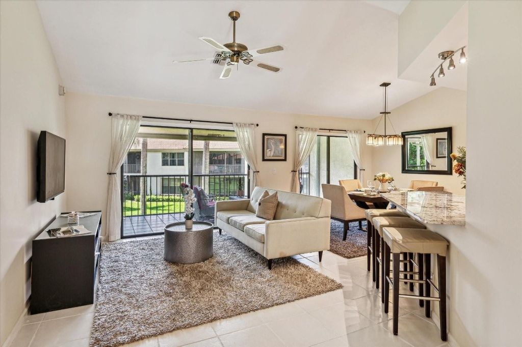 Photo of 5750 Coach House Circle, Boca Raton, FL 33486 (MLS # F10463829)