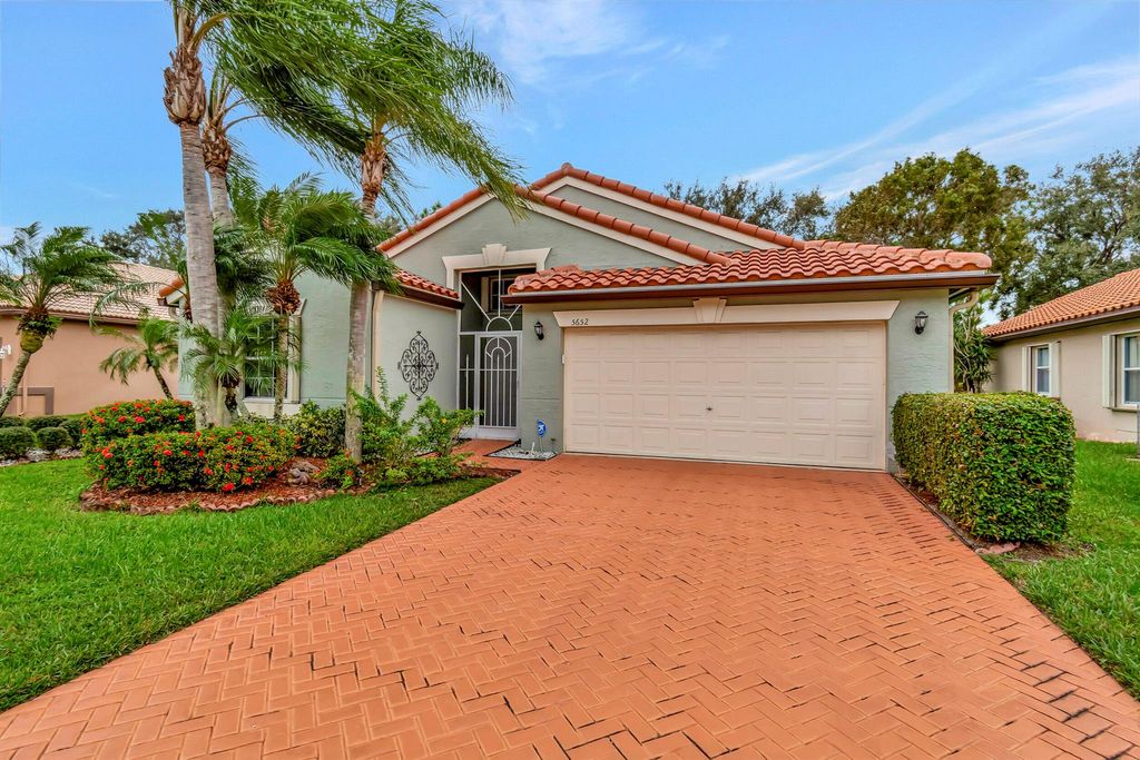 Photo of 5652 Swaying Palm Lane, Boynton Beach, FL 33437 (MLS # R10943817)