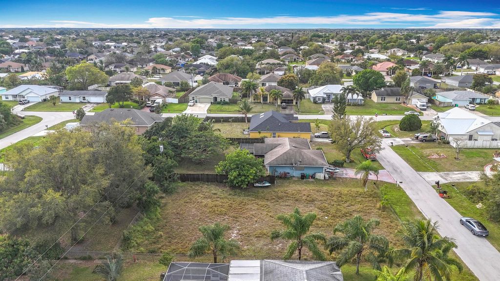 Photo of 3573 SW Pumpkin Street, Port Saint Lucie, FL 34953 (MLS # R11066562)