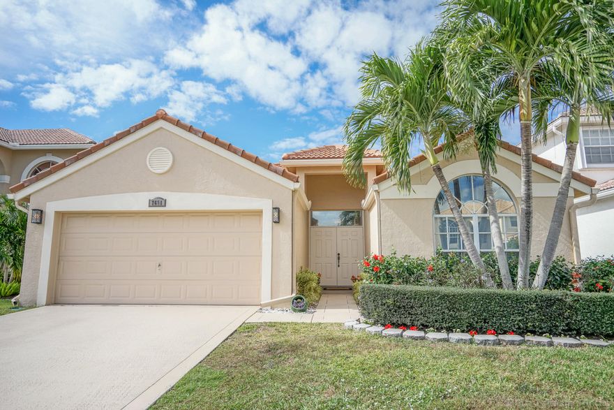 Beautiful home in desirable Lake Charleston where you can walk to A rated schools! This home has it all! As you approach you will notice the eye catching curb appeal, brand new roof and large driveway. Upon entering through the elegant foyer you will be greeted by spacious living areas, soaring cathedral ceilings and beautiful, neutral flooring throughout! The gorgeous kitchen which opens to a large great room offers wood cabinetry, newer stainless steel appliances, granite counter tops and a lovely snack bar along with a spacious eat-in area. This home also features a  wonderful formal dining room which is perfect for entertaining. The master bedroom is spacious and offers a luxurious master bathroom with beautiful cabinetry, dual sinks and a gorgeous roman tub along with a separate shower enclosure. The other two bedrooms in this lovely home are also spacious. Step outside into a lovely screened patio and large backyard which is fully fenced. Live the resort lifestyle with a low HOA fee in Lake Charleston! This beautifully maintained community offers a gorgeous, lakeside, resort style pool, several parks and playgrounds, basketball and tennis courts, and many walking and jogging trails. Located in an excellent school zone, just minutes to the Turnpike, I-95, Downtown West Palm Beach, Wellington, Boynton Beach, area beaches, 3 international airports this home is very convenient!